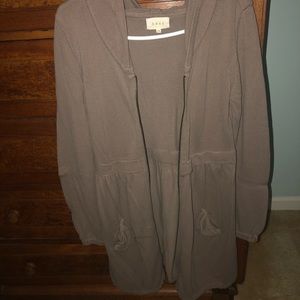 Hooded zip up knee length sweater w/pockets.